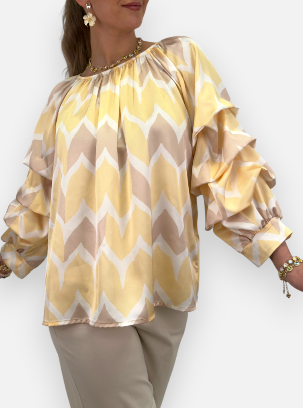 Glansig blus med volymärm - gul och beige