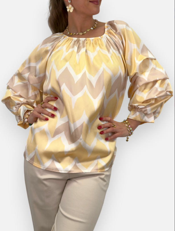 Glansig blus med volymärm - gul och beige